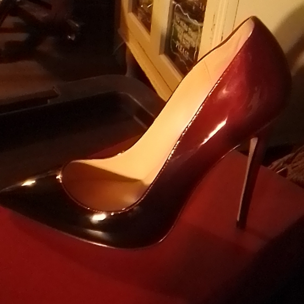 Red and black vocosi heels